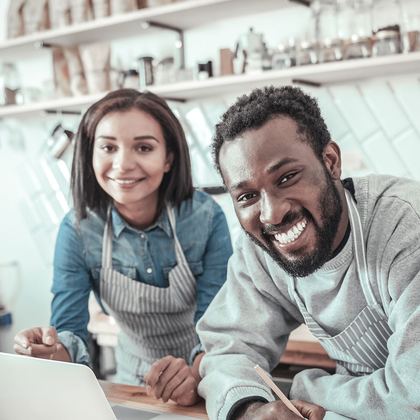 Two small business owners working together
